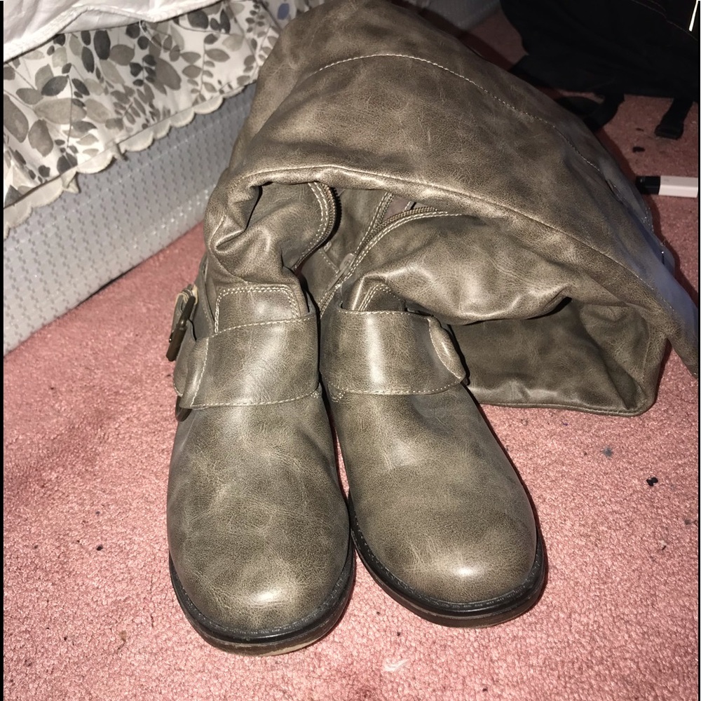 High-rise zip up boots.
